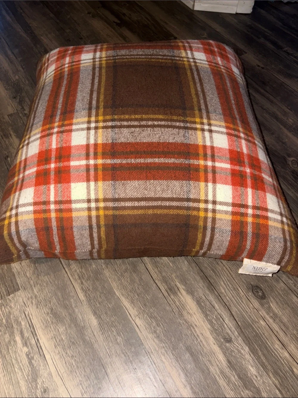 Nido plaid throw